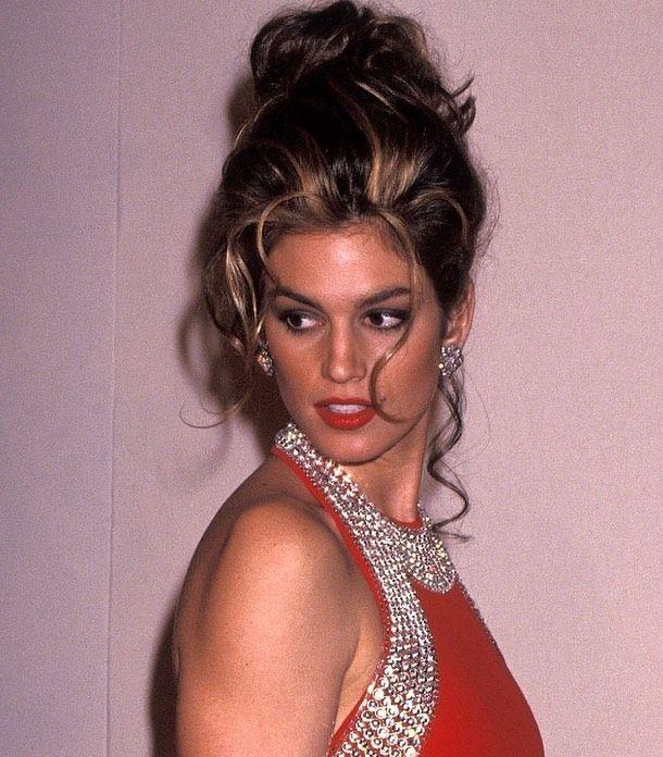 Supermodel updo with face framing layers
