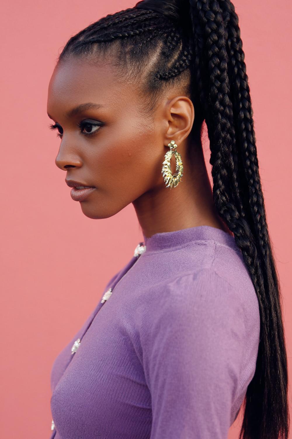 16. Best Hairstyles for 2026: Braided Ponytail Hairstyle with Sleek Base and Statement Braid