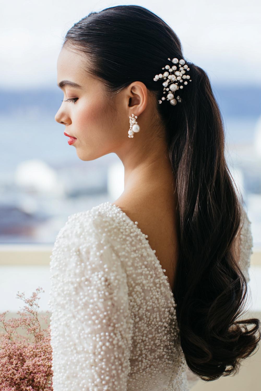 23. Best Hairstyles for 2026: Bridal Hairstyle with Pearl Pins and Soft Side Sweep