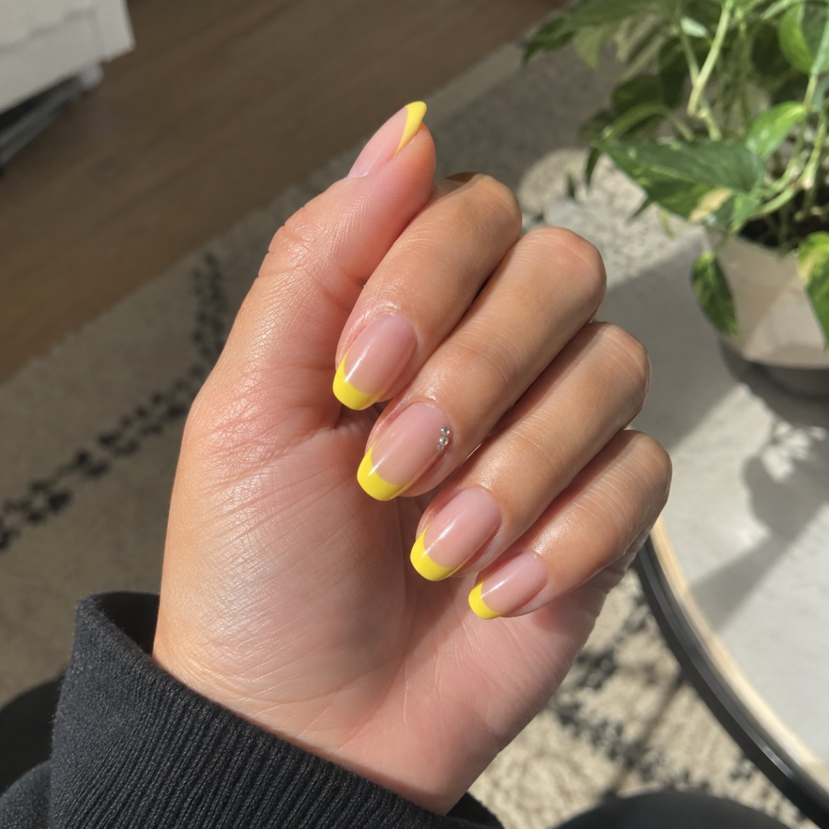 Bright yellow crystal French tips