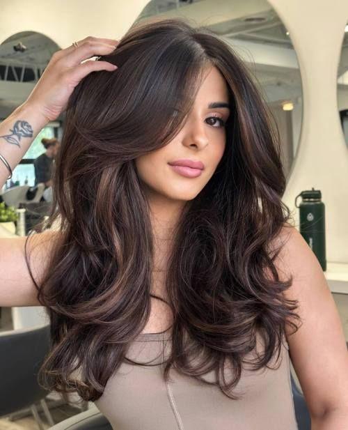 Brunette blowout layers curtain bangs