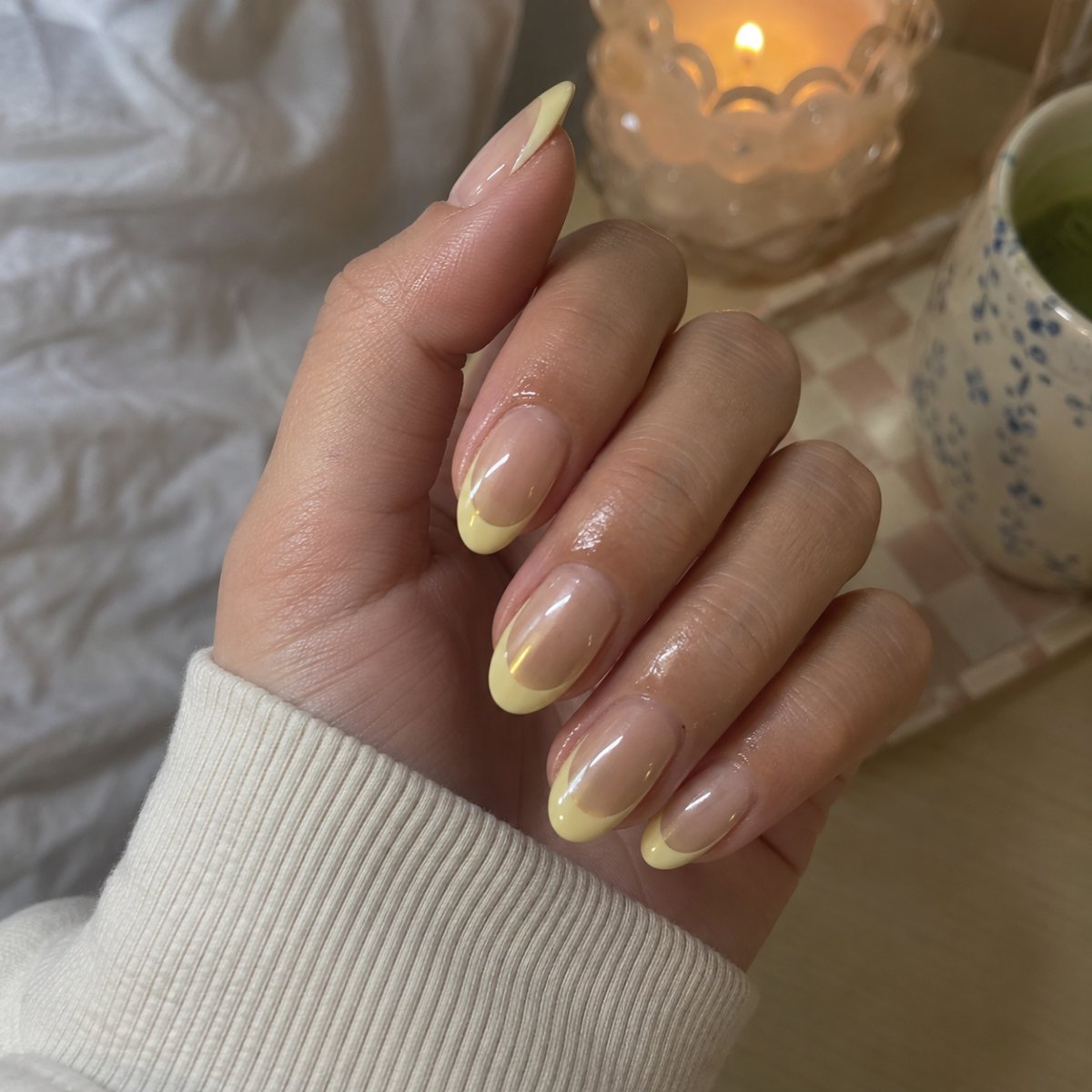 Butter yellow chrome French tip nails