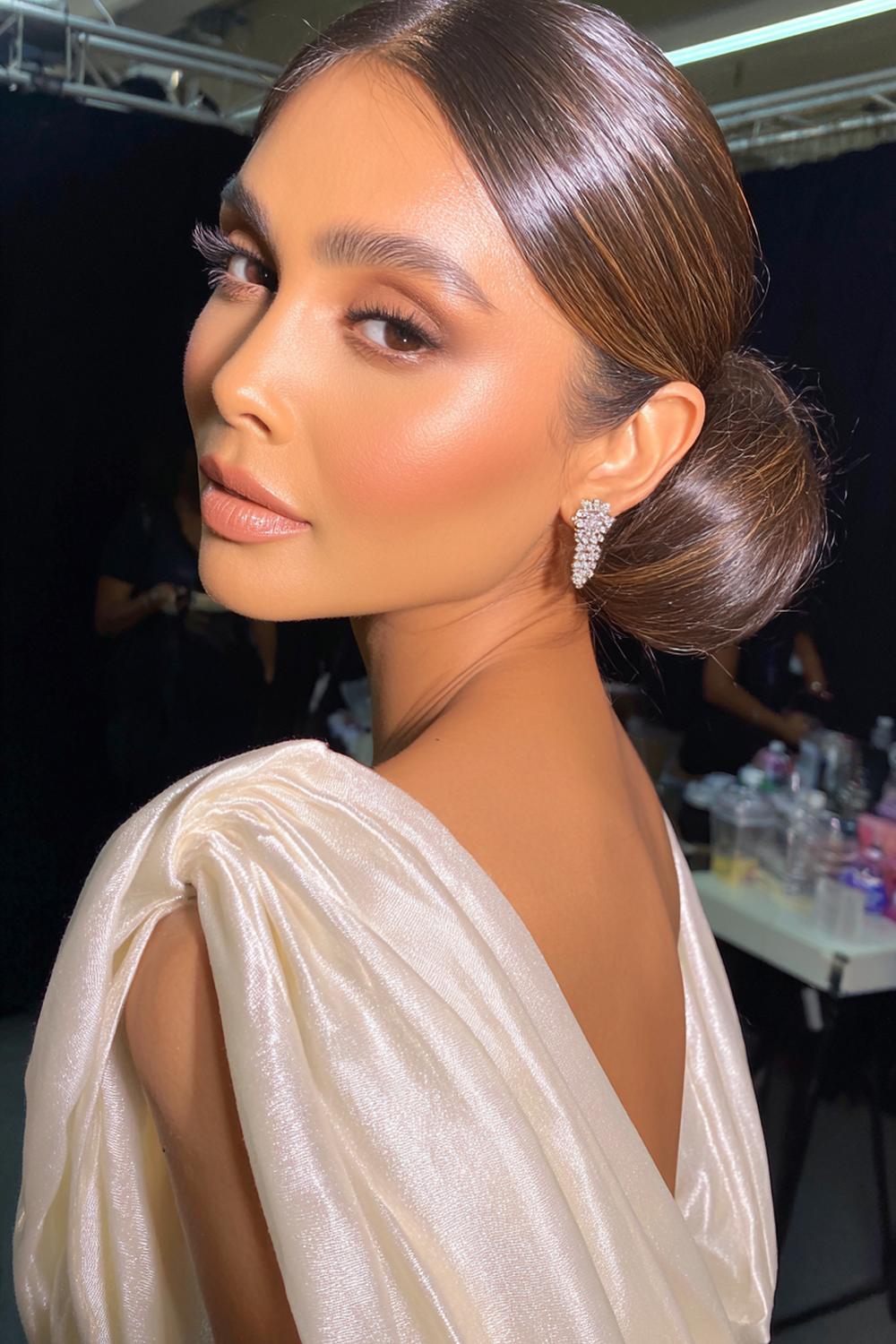 3. Sculpted Celebrity Inspired Hairstyles 2026 Low Bun with Gloss Finish