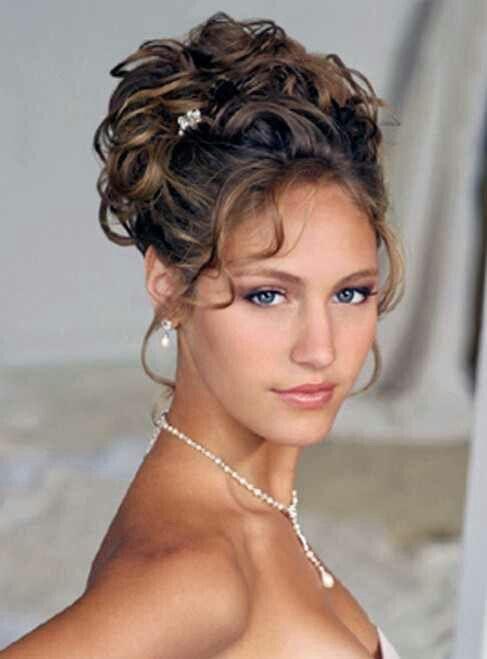 Curly prom updo with romantic tendrils