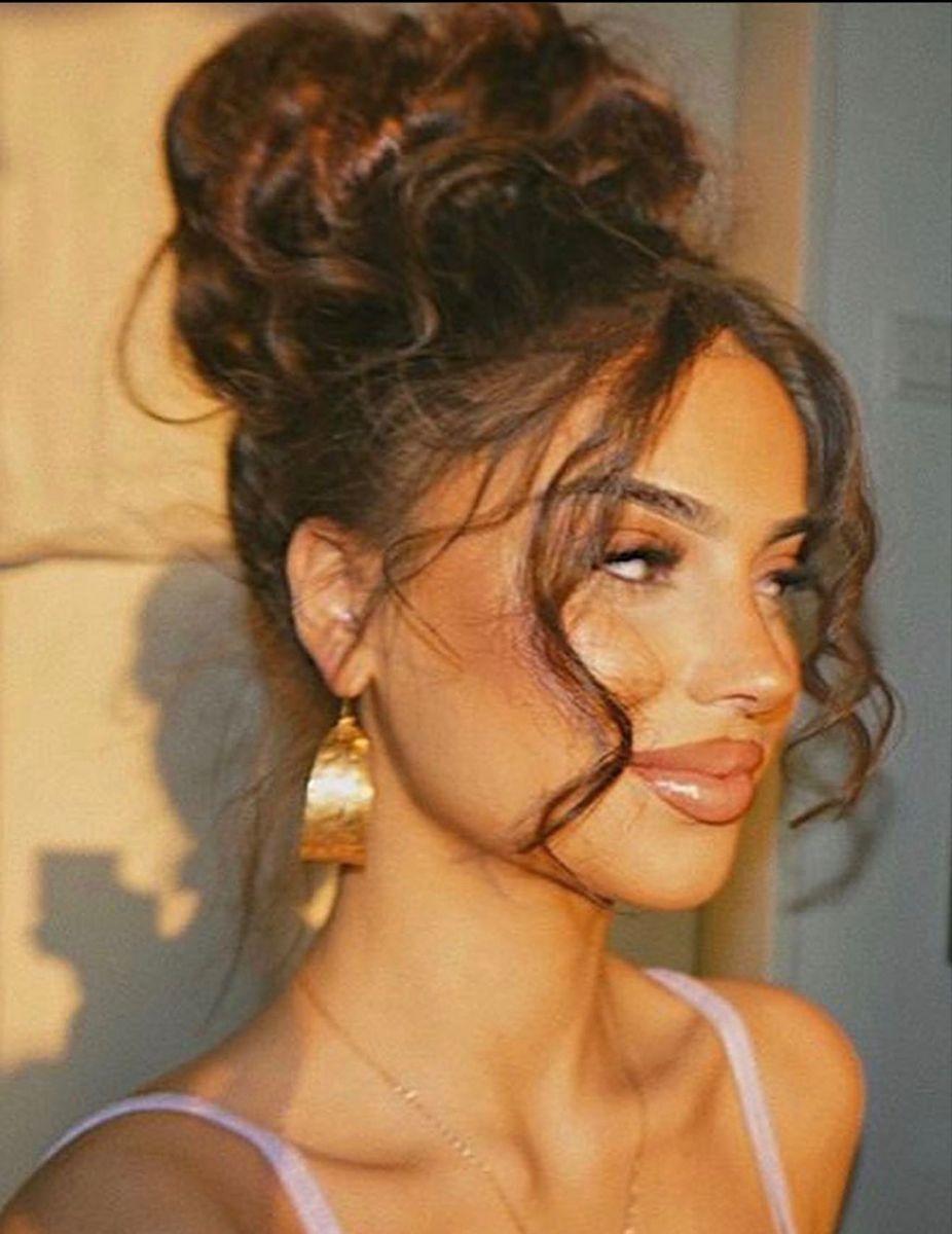 Curly messy bun prom hairstyle