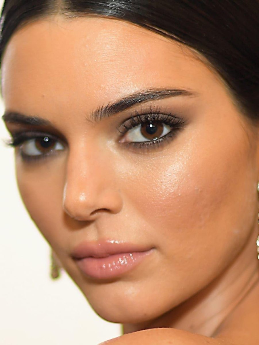 Kendall Jenner dewy highlighted skin