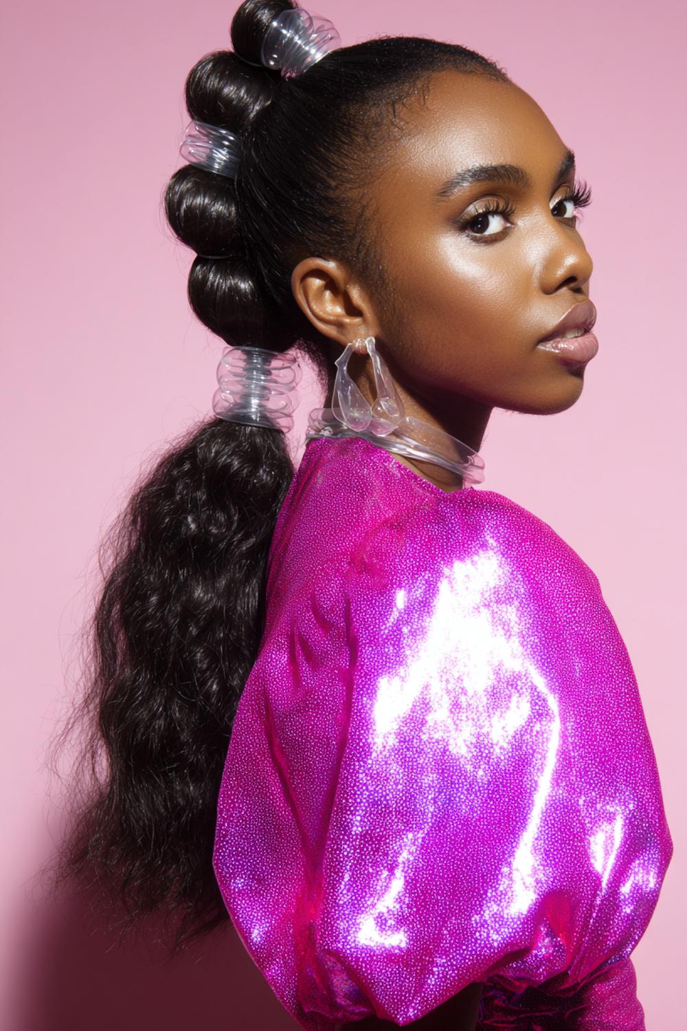 11. Bubble Ponytail Hairstyle with Clear Elastics and Glossy Shine