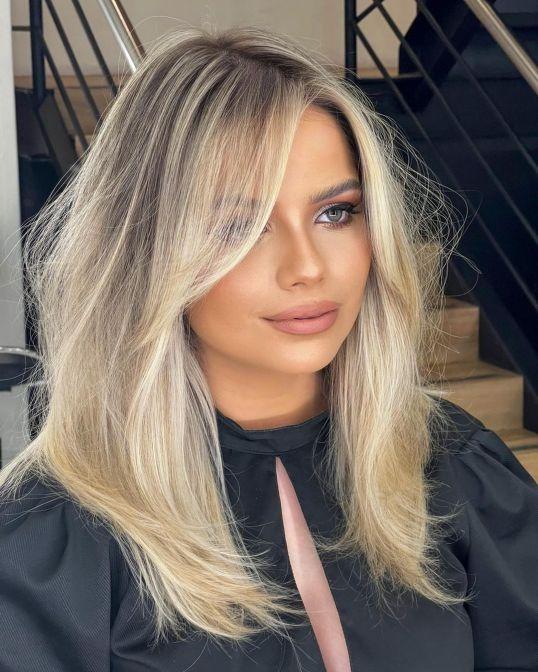 Side part curtain bangs style