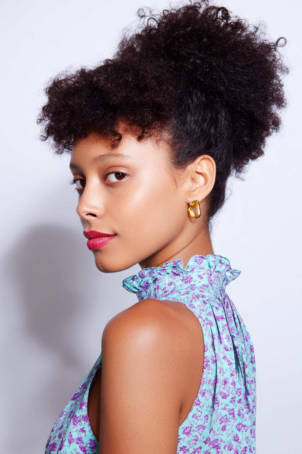 19. Hairstyles for All Hair Types: Curly Puff with Defined Edges and Soft Volume