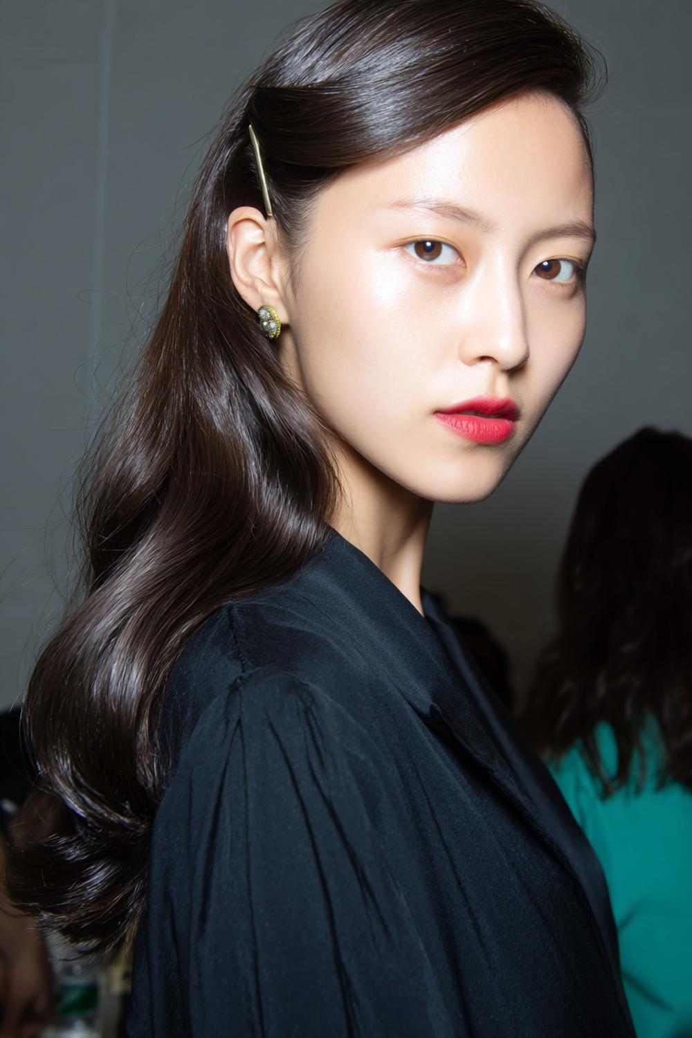 25. Hairstyles for All Hair Types: Deep Side Part with Tucked Pin and Sleek Lengths