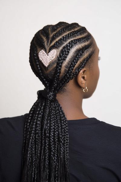 19. Heart-Part Cornrow Design for Hairstyles for Black Women Cornrows With Curved Motifs and Braided Pony Base