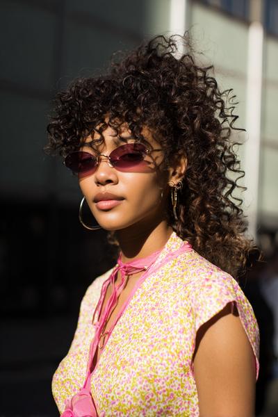 13. Claw-Clip Twist with Face-Framing Spirals for hairstyles for curly hair easy ideas