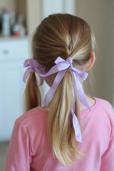 1. Ribbon-Wrapped Double Ponytails for hairstyles for kids easy ideas