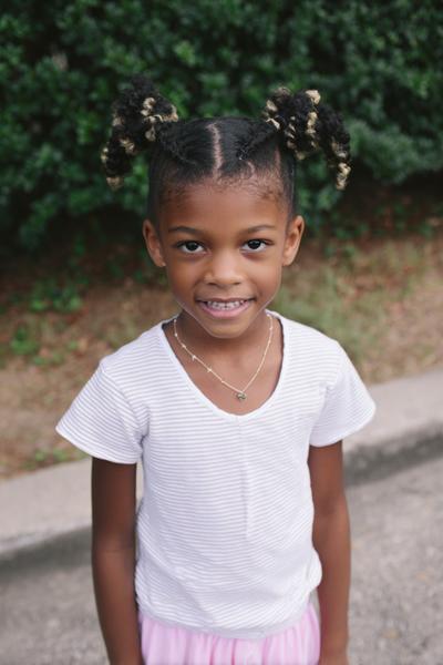 5. Two-Strand Twist Space Buns for hairstyles for kids black ideas