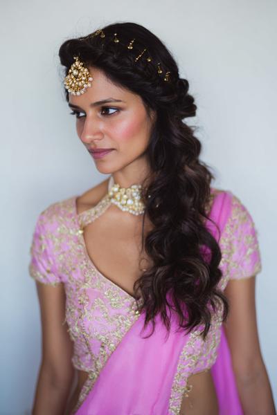 21. Braided Crown with Loose Length and Maang Tikka Space for hairstyles for long hair on saree ideas