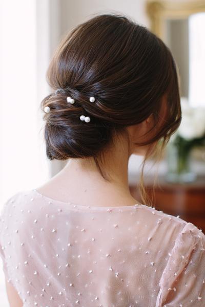 13. Pearl-Pinned Low Chignon for hairstyles for medium length hair weddi... ideas