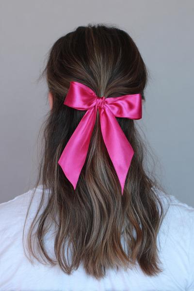 5. Ribbon-Tied Half-Up Bow for hairstyles for medium length hair school ideas