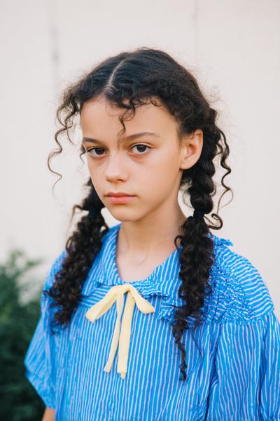 17. Two French Braids into Curly Ends for Hairstyles for School Curly Hair Braids with a Center Part