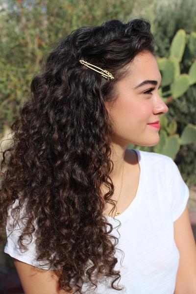 16. Side-Part Curly Clip-Back With Gold Barrette for hairstyles for school down curly hair ideas