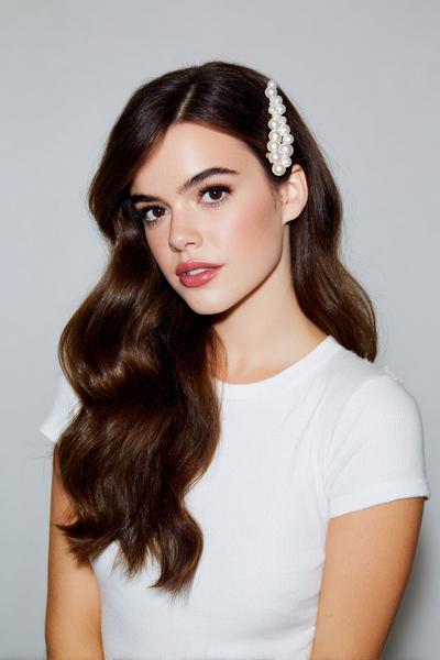 2. Soft Side-Part Sweep With Pearl Pins for hairstyles for school down simple ideas