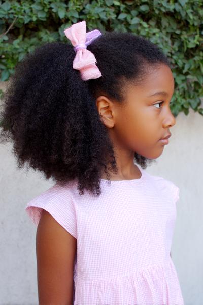 16. Half-Up Puff with Bow Clip for Hairstyles for School Natural Hair Kids Style