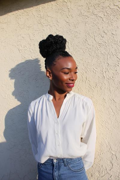 23. High Topknot Bun with Laid Edges for Hairstyles for School Natural Hair Bun Goals