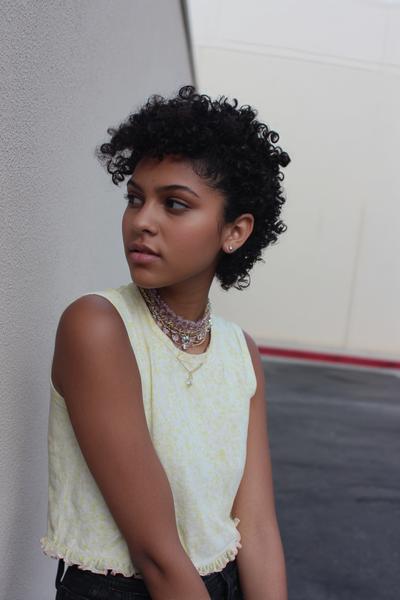 19. Pineapple with Defined Tendrils for hairstyles for school short hair curly ideas