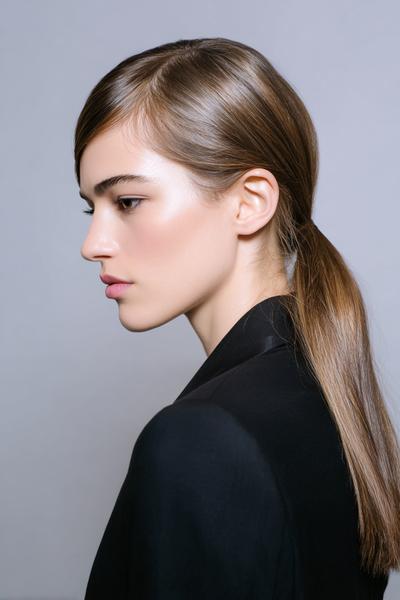 24. Straight Hair Low Pony with Sleek Side Sweeps