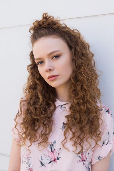 13. High Pineapple for Hairstyles for School Curly Hair with Soft Tendrils