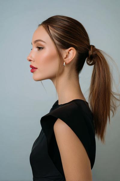 21. Medium-Length Sleek Ponytail with Wrapped Base for hairstyles for thin hair medium ideas