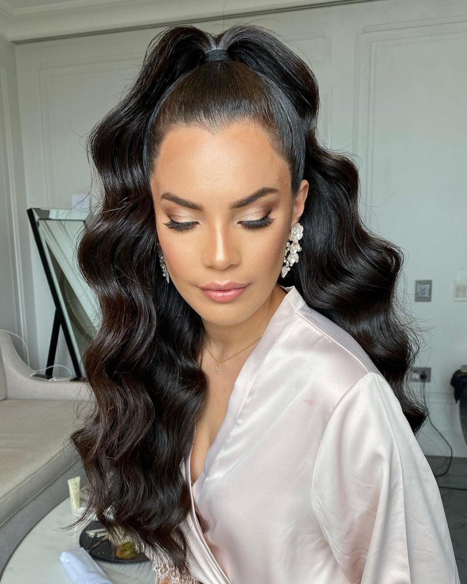 Half up ponytail Hollywood waves