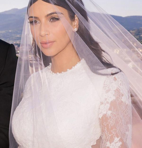 Kim Kardashian center parted bun