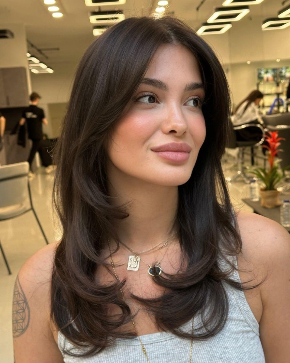 Layered curtain bangs haircut