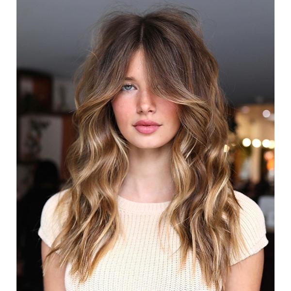Wavy layered hair curtain bangs