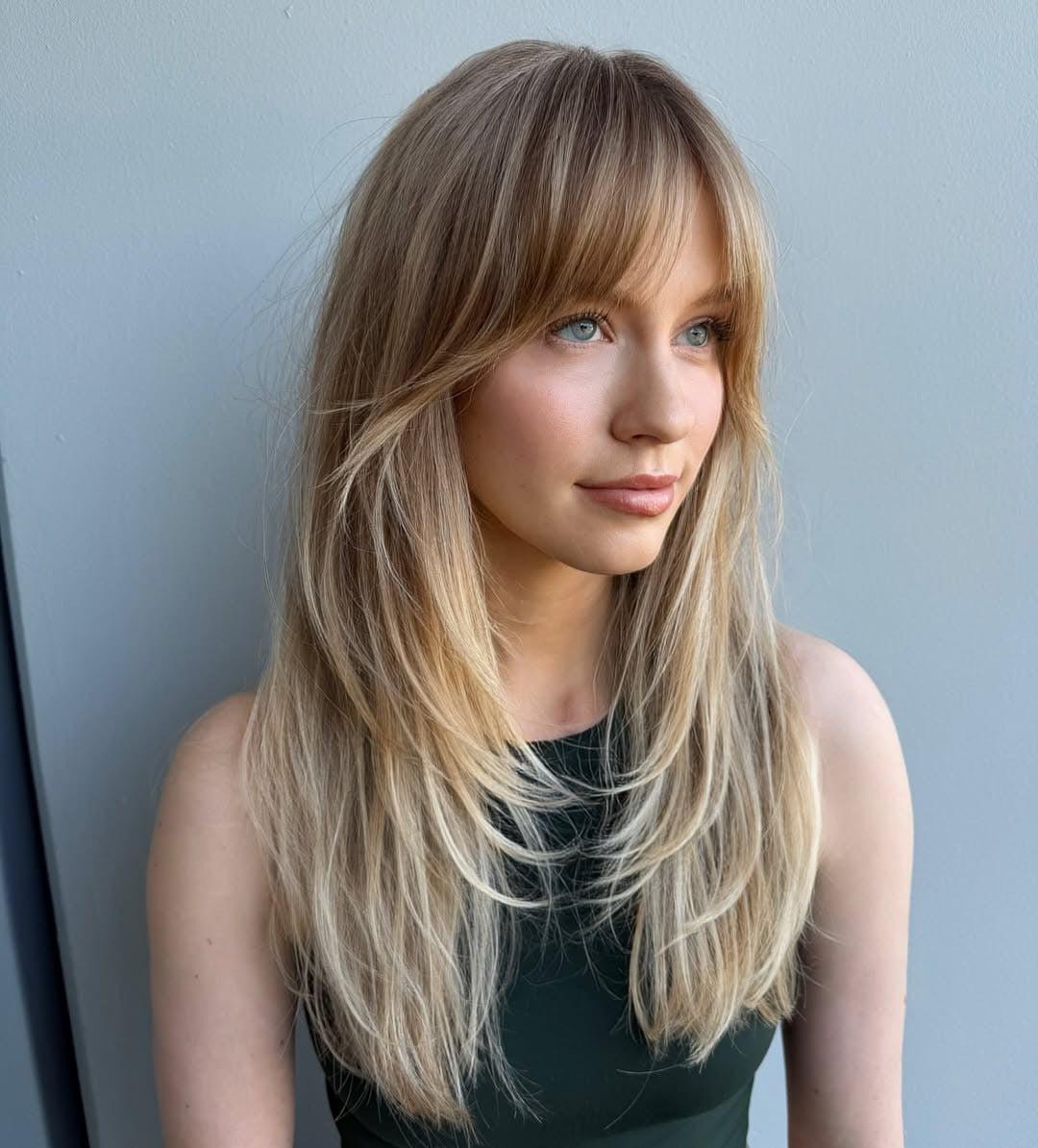 Wispy layered ends with curtain bangs