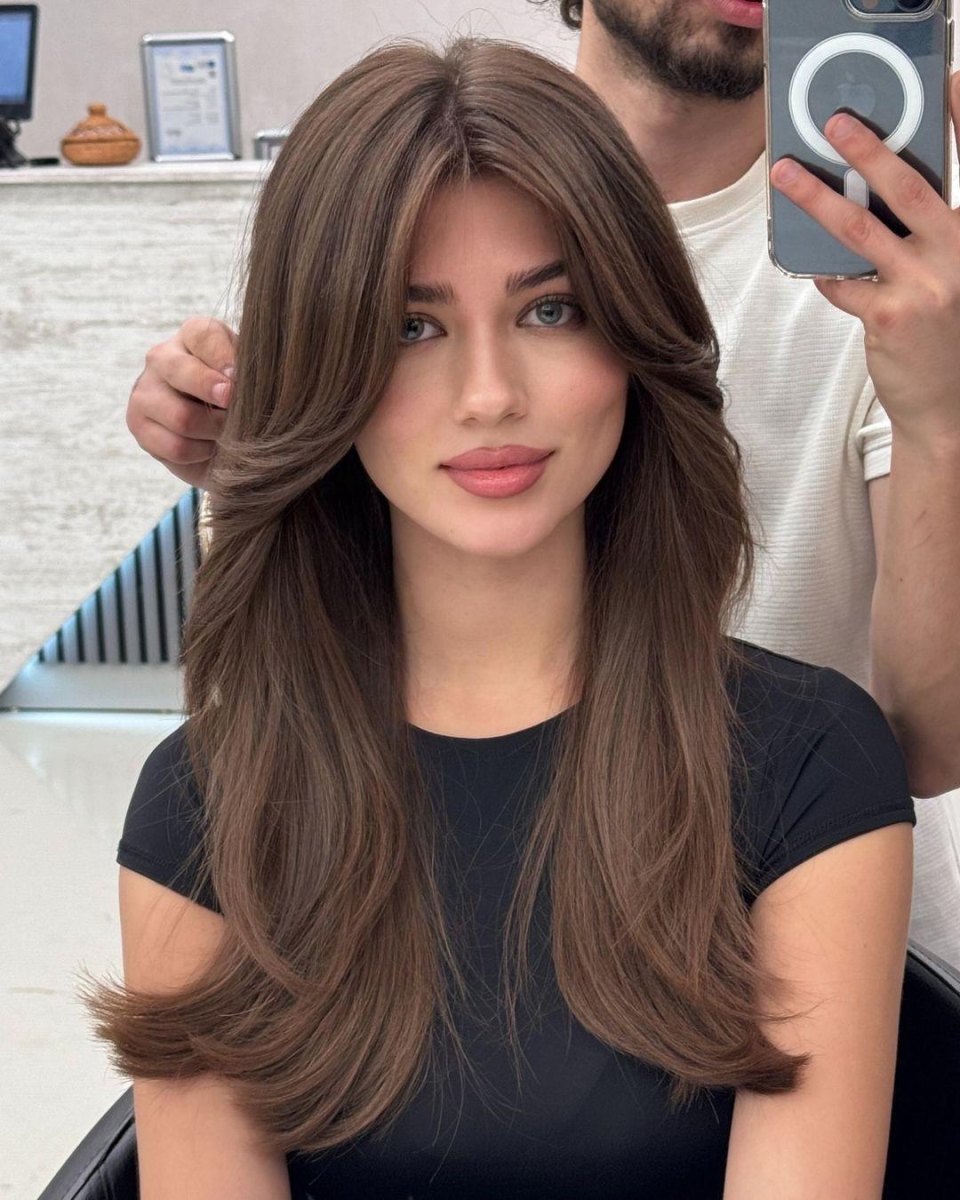 Long curtain bangs with layers