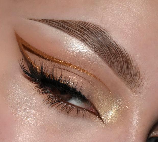 Pink cut crease eyeliner with black liner