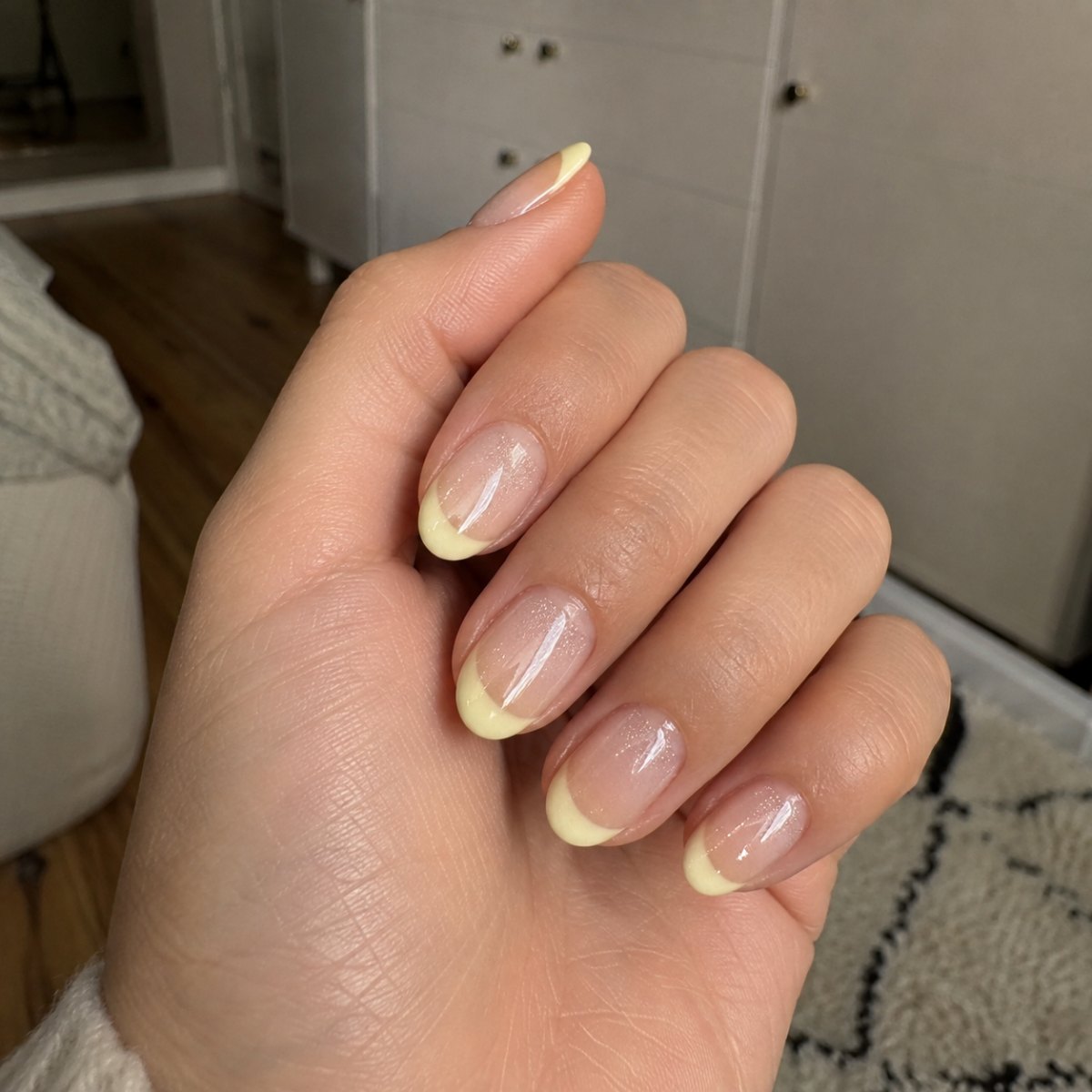 Milky yellow shimmer French nails