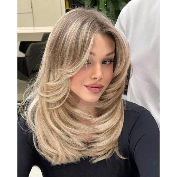 Modern 90s inspired layered blowout