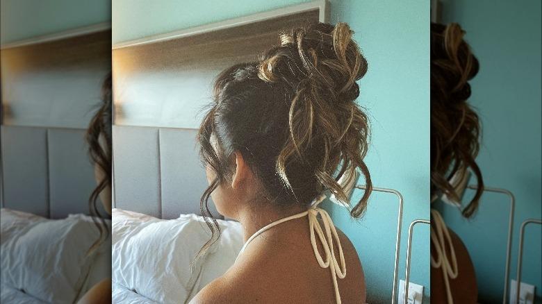 Modern messy 90s prom updo