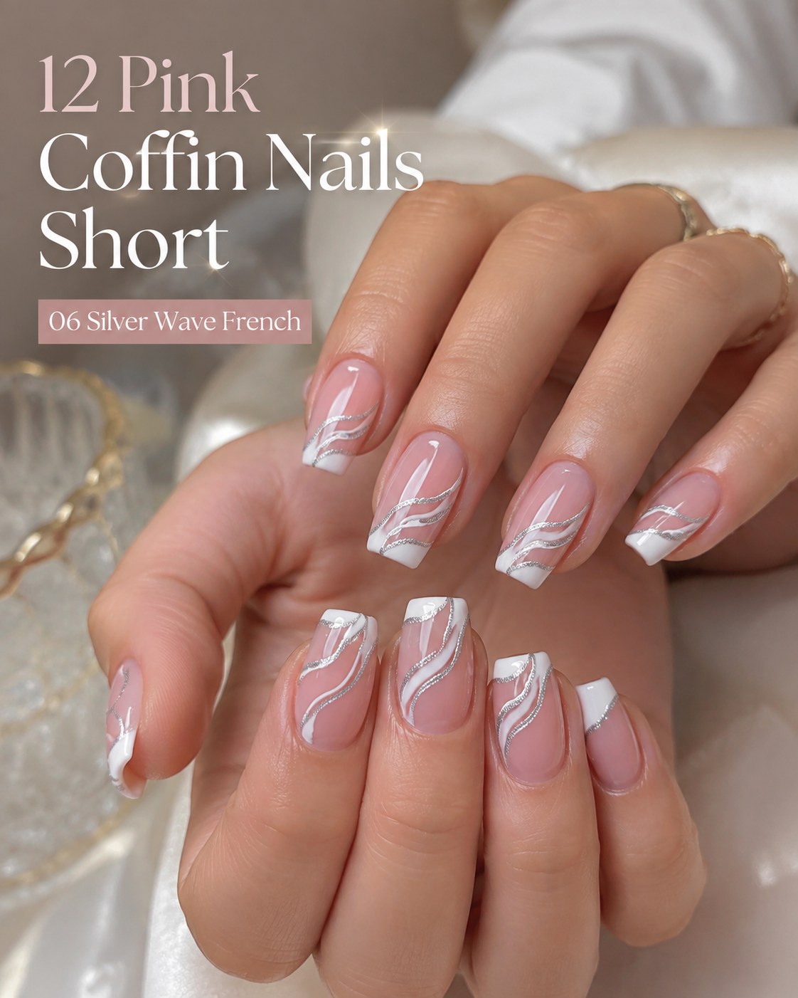 Short pink coffin nails with a silver wave French manicure and hand-painted metallic line detail
