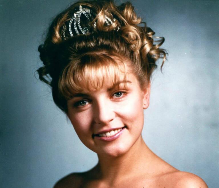 Retro updo with feathered face layers