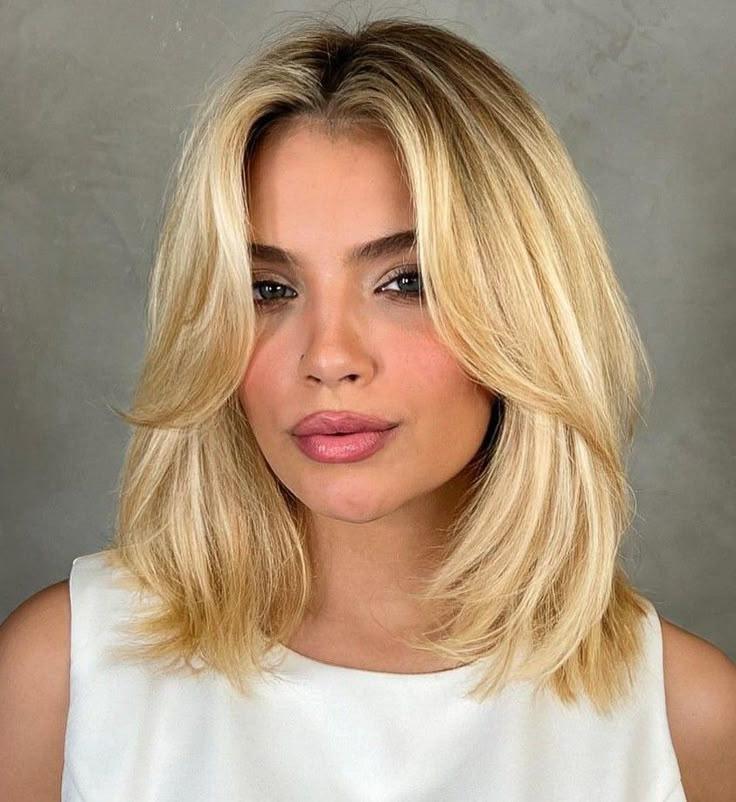 Shoulder length blowout curtain fringe
