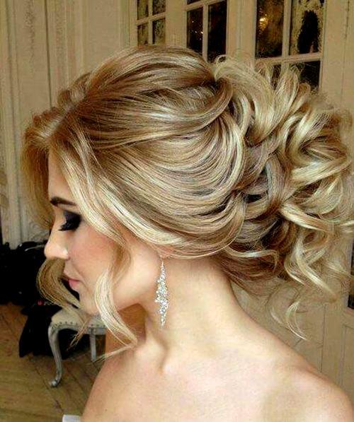 Side swept messy prom updo