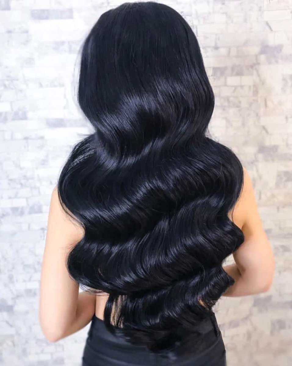 Sleek black shiny Hollywood waves