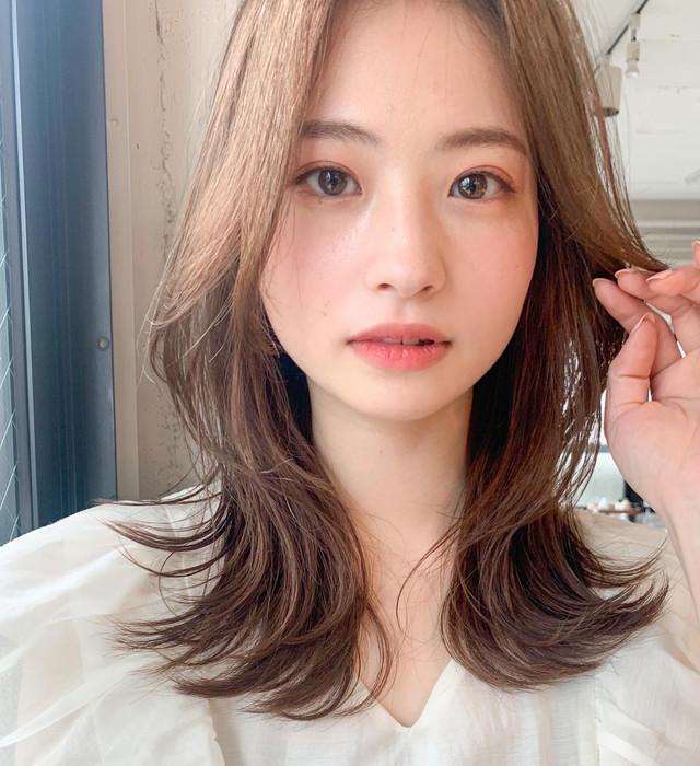 Soft wolf cut round face