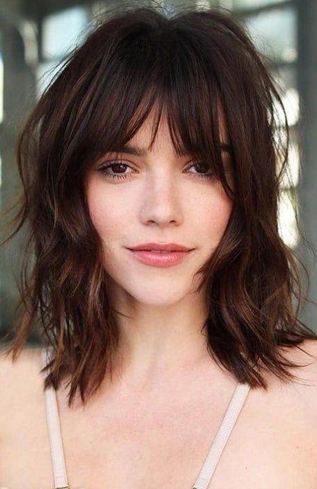 Wispy bangs wolf cut