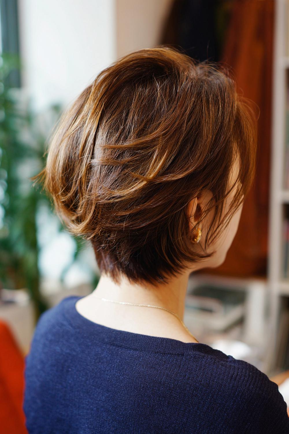 5. Bixie Hair Cut with Feathered Crown Lift