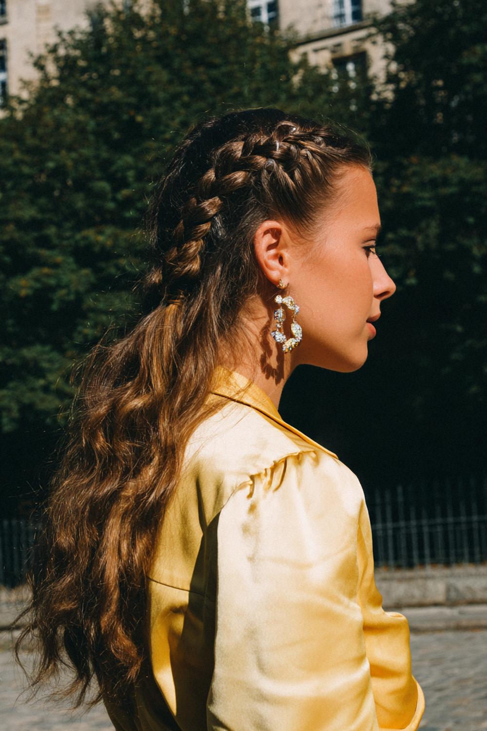 11. Trendy Hair Looks 2026: Braided Crown with Loose Texture and Glossy Ends