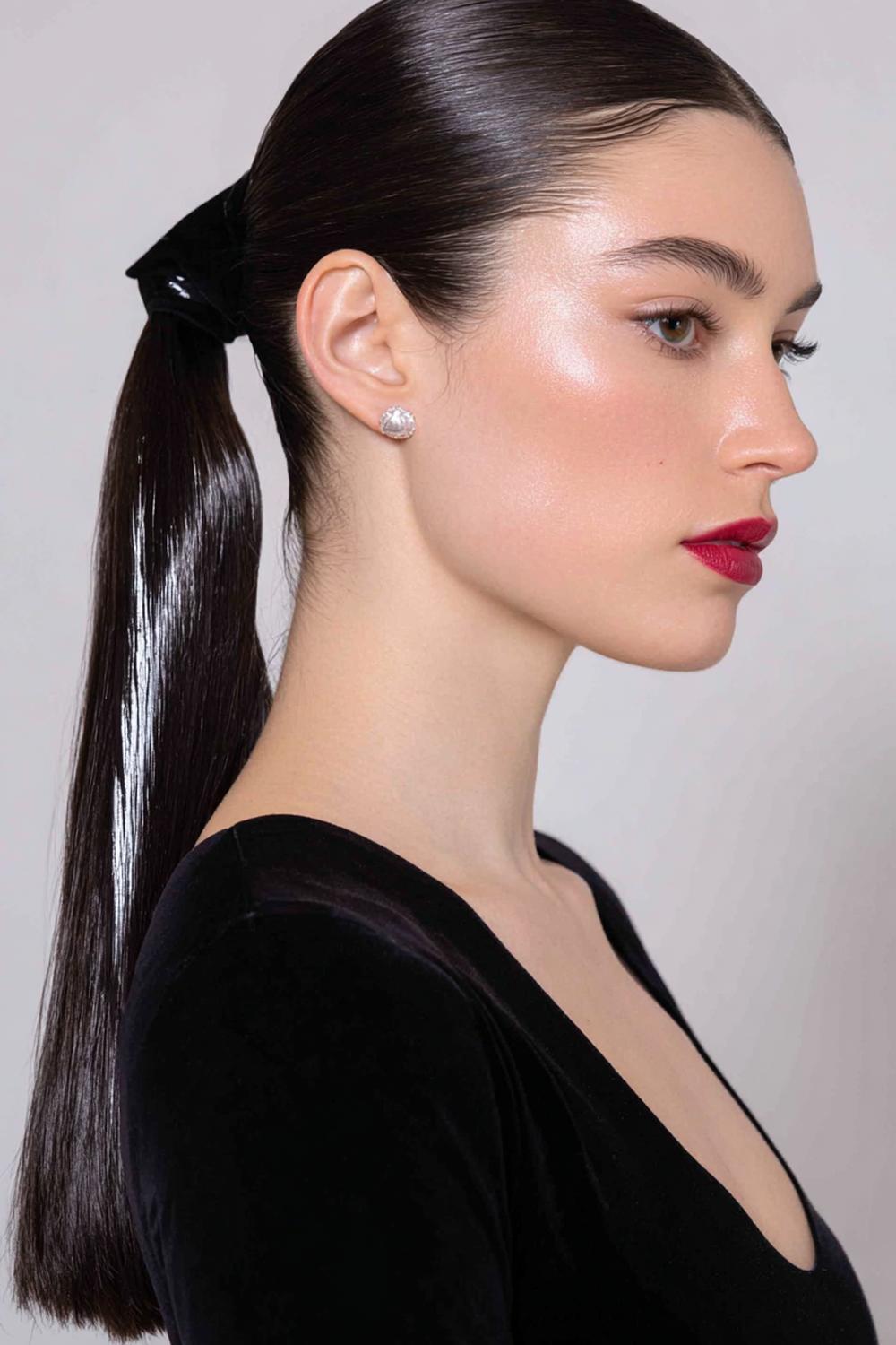 9. Trendy Hair Looks 2026: Sleek Ponytail with Wrapped Base and Mirror Shine